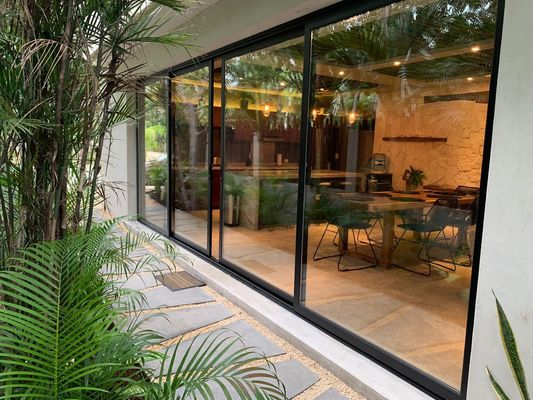 Ηχομόνωση Γαλλικό στυλ UPVC συρόμενες γυάλινες πόρτες για απρόσκοπτη εσωτερική-εξωτερική ροή